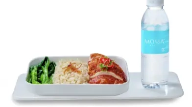 Plate of chicken rice and bottle of water, available to purchase on Jetstar Asia flights.