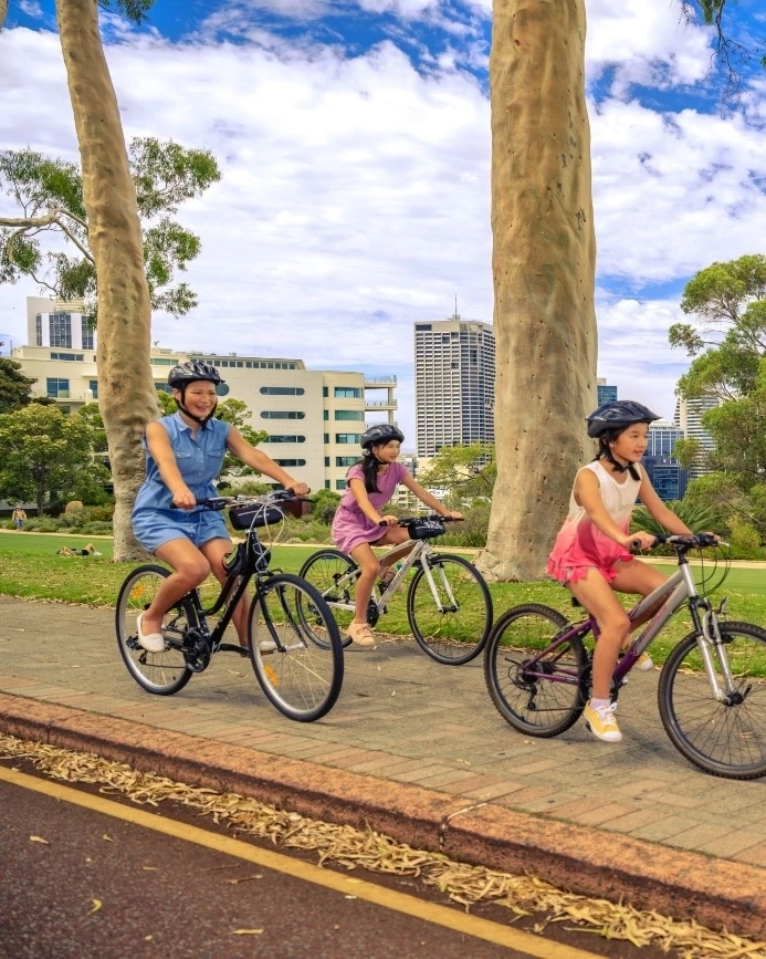 Family cycling at Kings Park and Botanic Garden, Perth Western Australia. Image credit: Tourism Western Australia