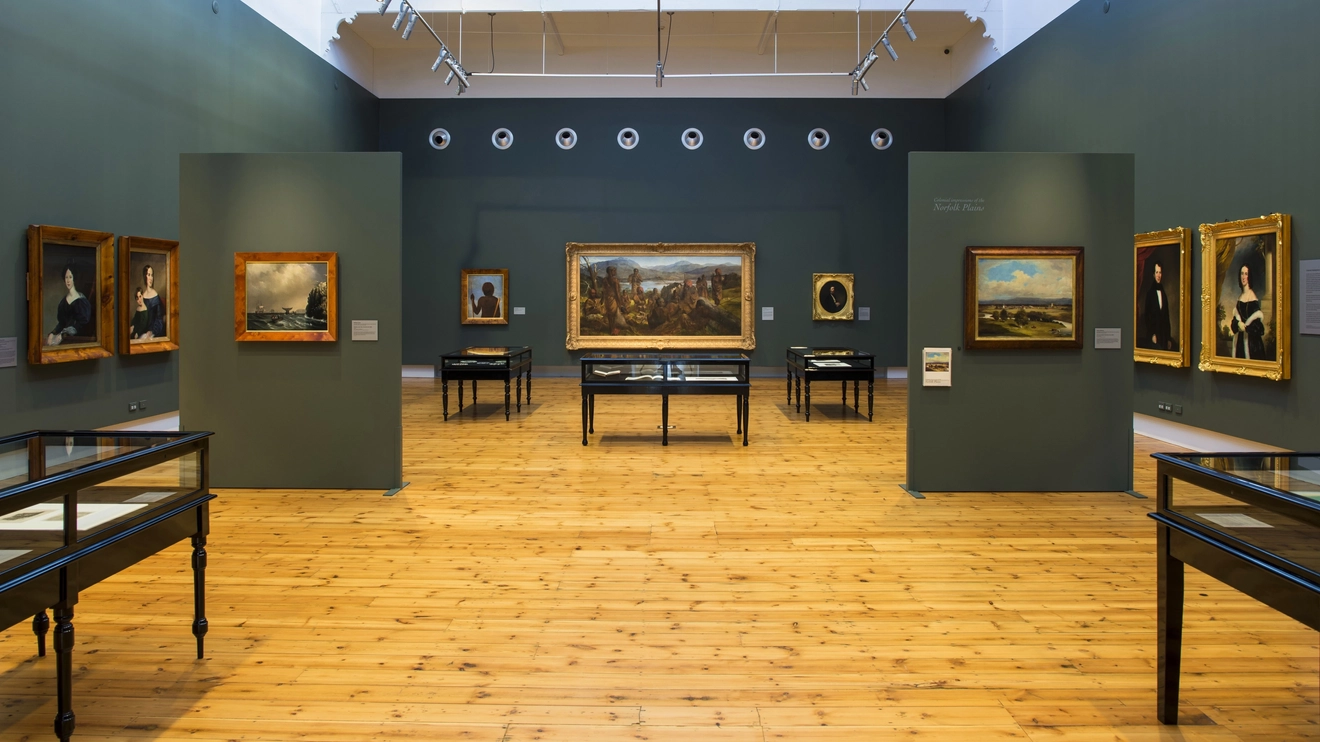 A room exhibiting paintings at the Queen Victoria Museum and Gallery in Launceston. Image credit: Tourism Tasmania/Rob Burnett