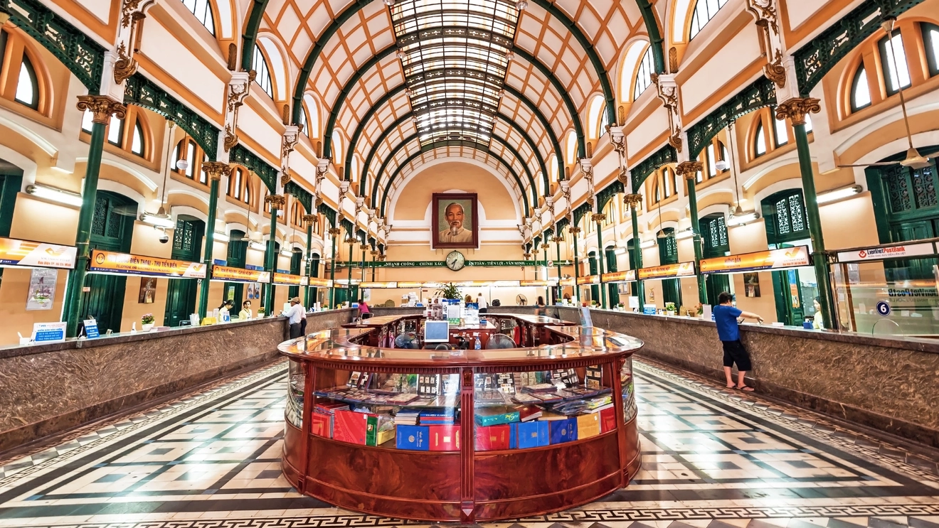 The domed roof and ornate interior of Saigon Central Post Office, Ho Chi Minh City, Vietnam. Image credit: stock.adobe.com