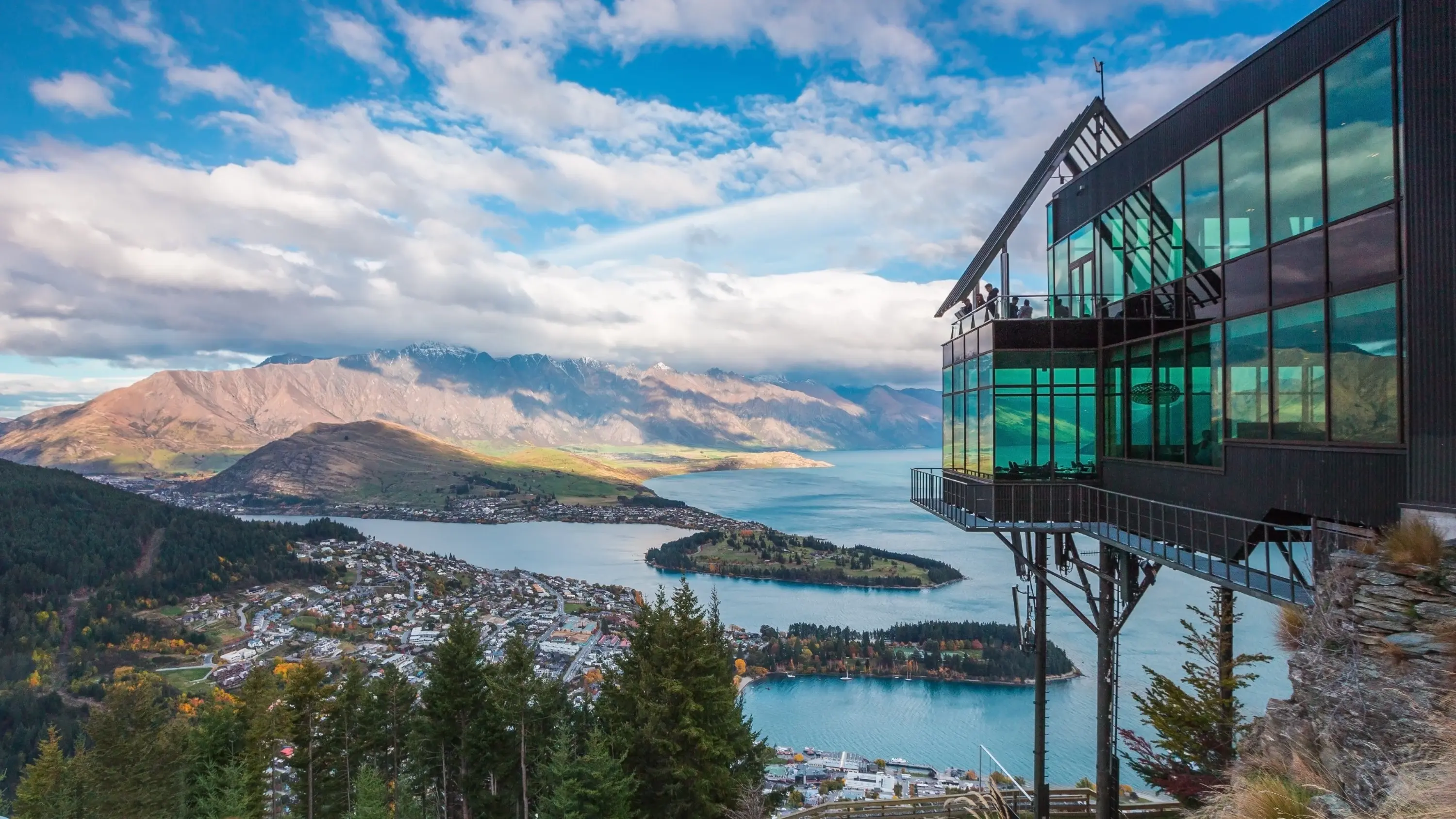 Aerial daytime view of Queenstown, with viewing platform in the foreground. Image credit: stock.adobe.com