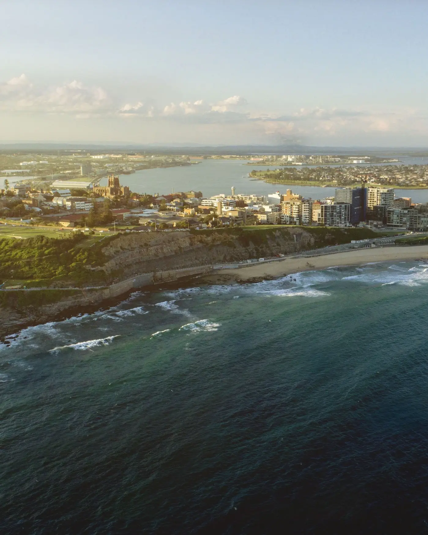 Aerial view of Newcastle coastline, skyline and Newcastle Beach. Image credit: Destination NSW