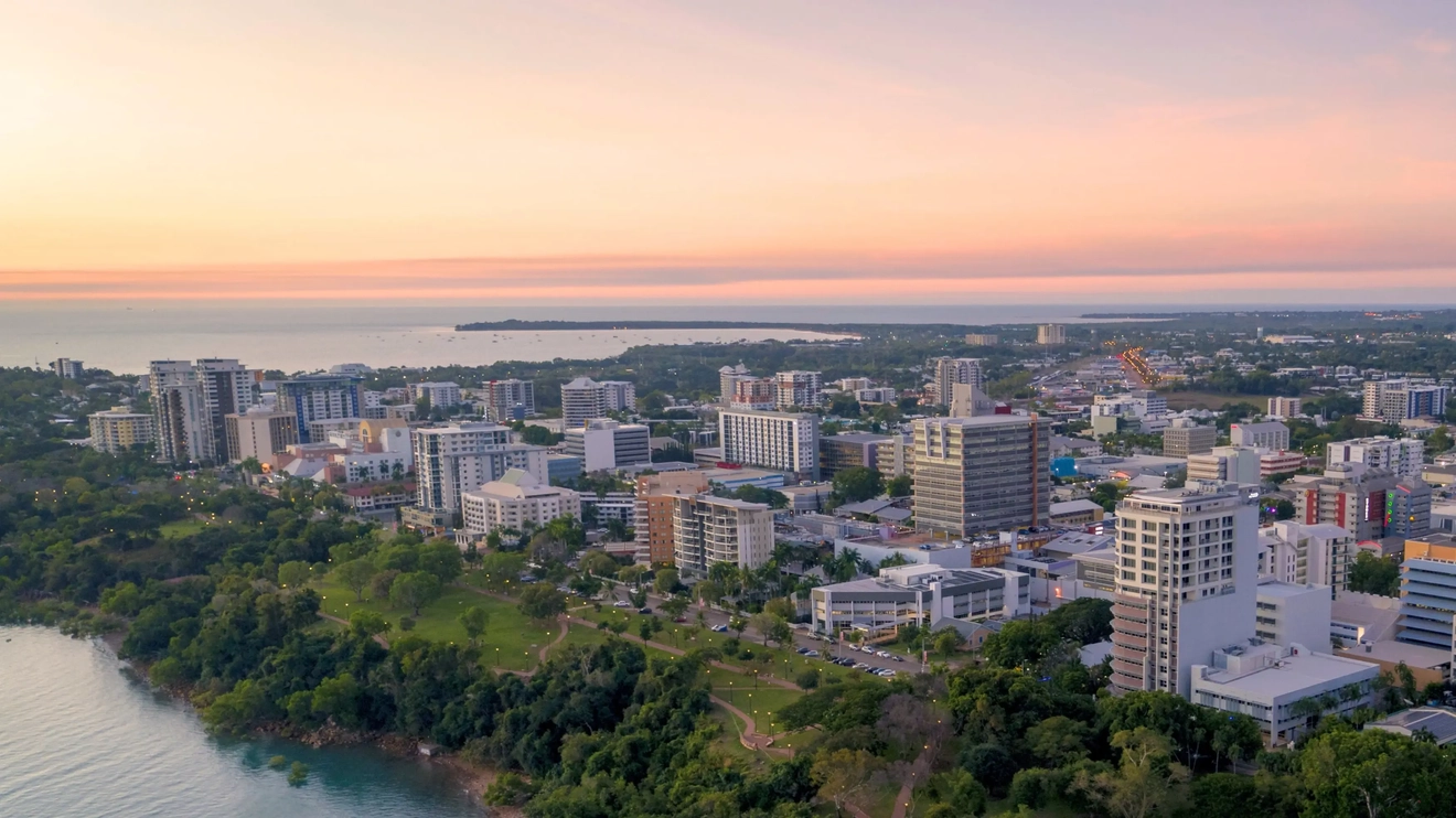 Aerial view of Darwin CBD and esplanade at dusk. Image credit: Tourism NT