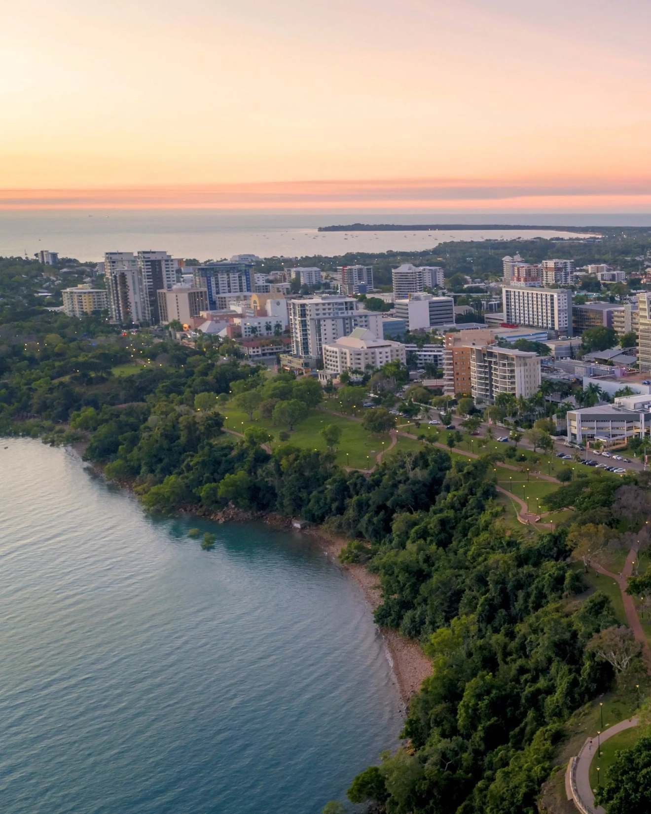 Aerial view of Darwin CBD and esplanade at dusk. Image credit: Tourism NT