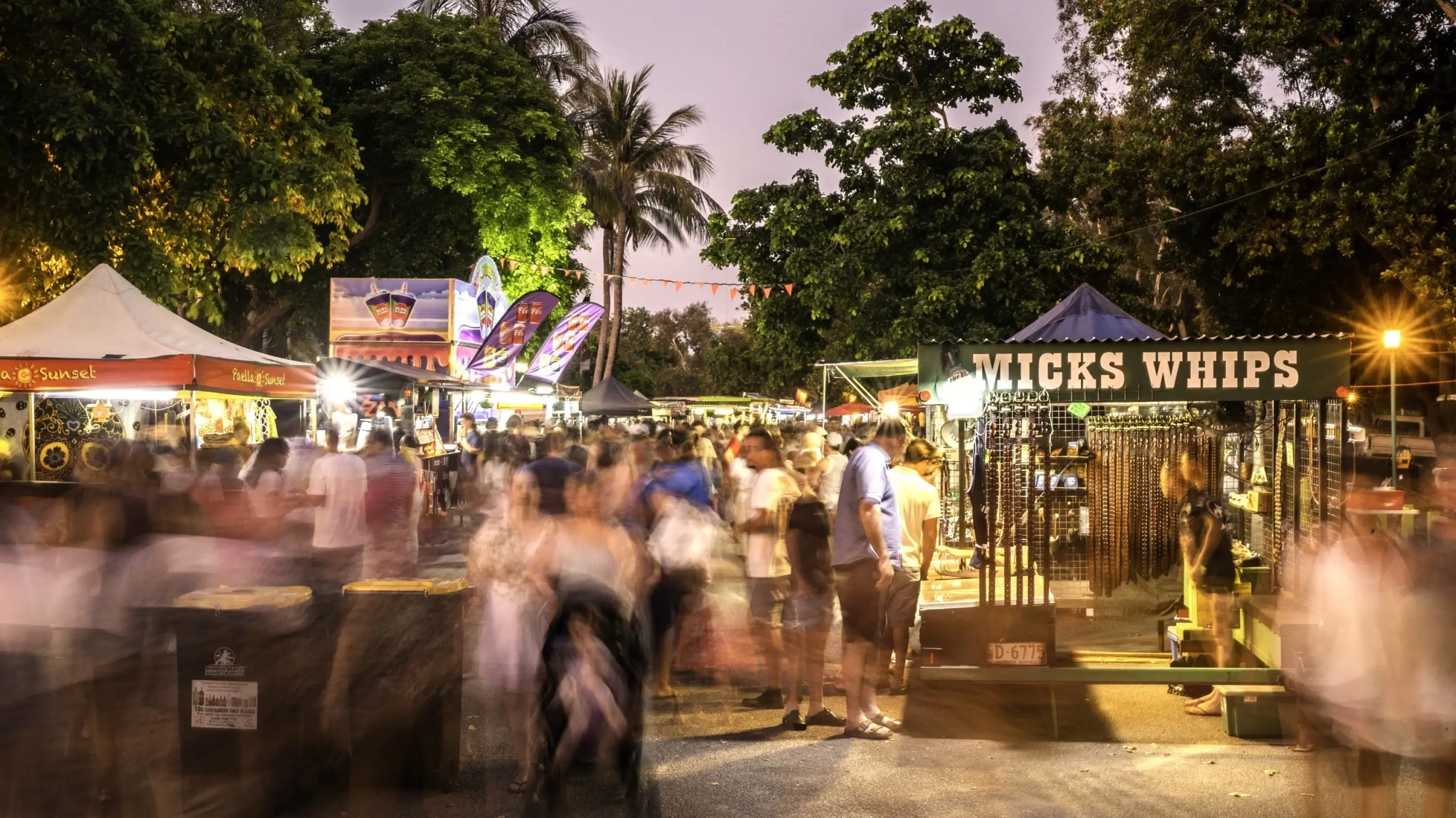 Crowds and stalls at Mindil Beach Sunset Market, Darwin. Image credit: Tourism NT/Helen Orr