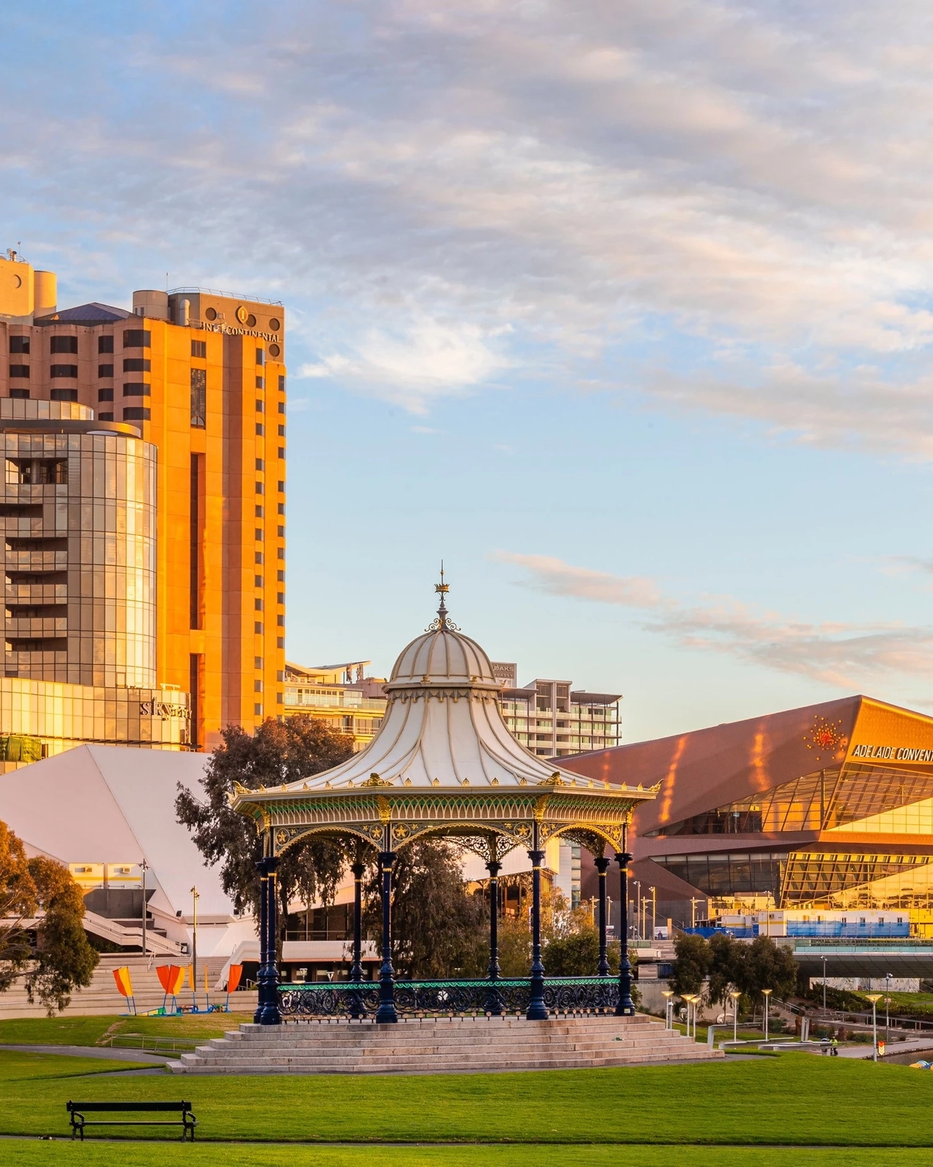 Adelaide riverbank precinct with rotunda in foreground, Torrens River and CBD buildings in background, Adelaide, South Australia. Image credit: South Australian Tourism Commission