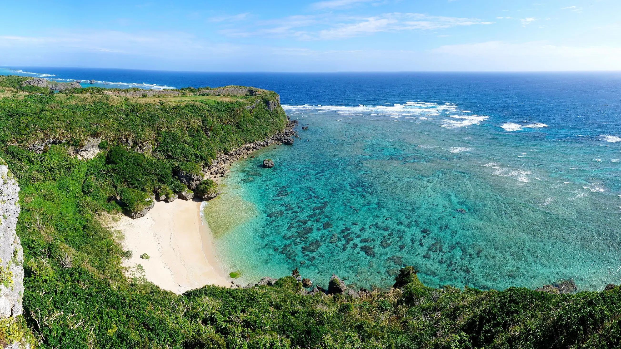 Cliff-top view of Kafu-Banta beach on Miyagi Island, Okinawa, Japan. Image credit: stock.adobe.com