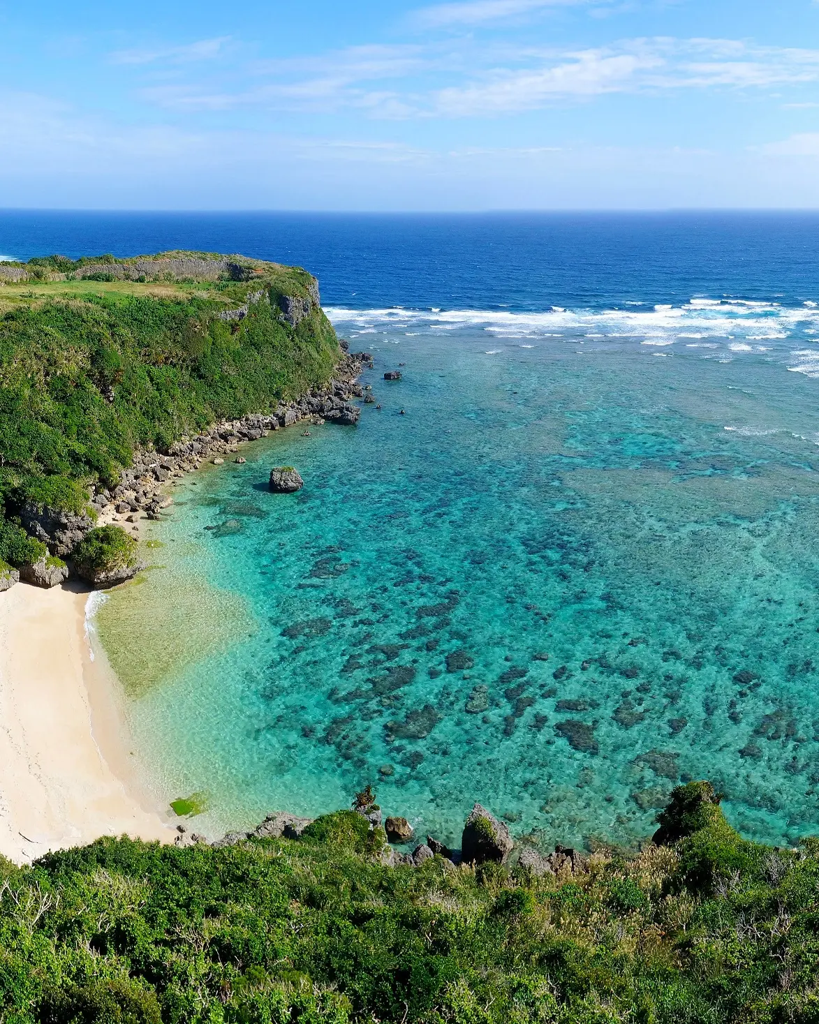 Cliff-top view of Kafu-Banta beach on Miyagi Island, Okinawa, Japan. Image credit: stock.adobe.com