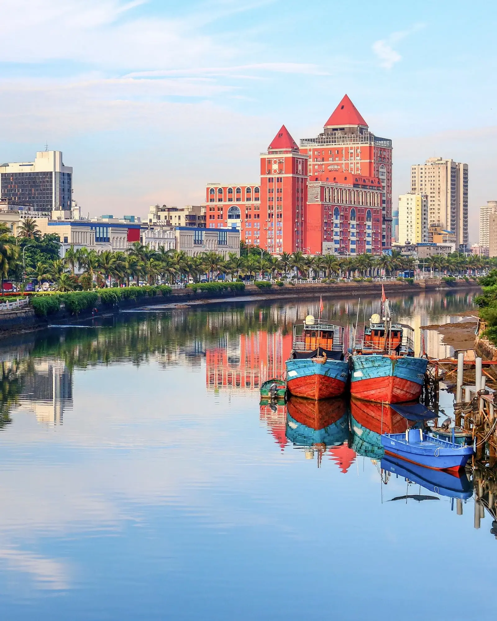 Haikou city skyline with river in foreground. Image credit: stock.adobe.com