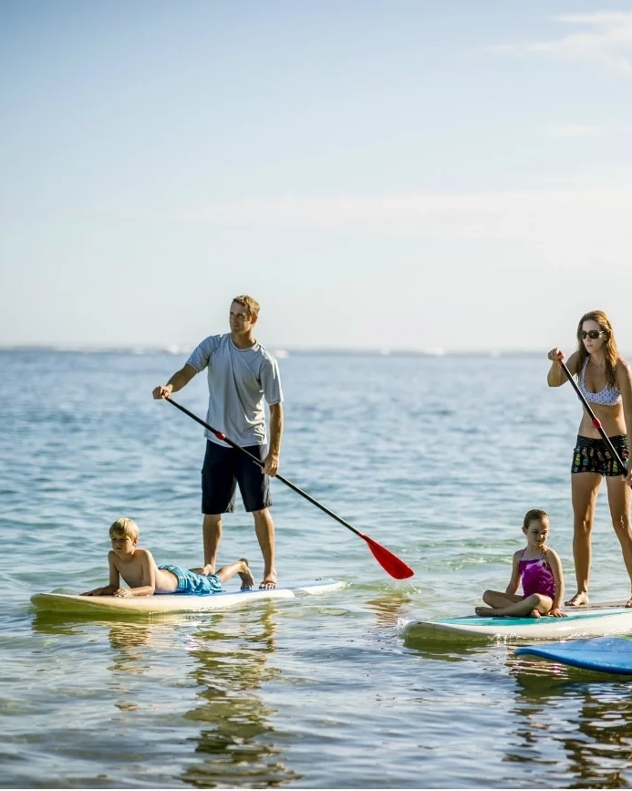 Family paddle boarding