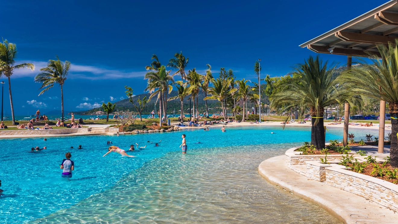 Children play in the man-made lagoon at Airlie Beach, Whitsunday Coast, Queensland. Image credit: Martin Valigursky/Shutterstock.com