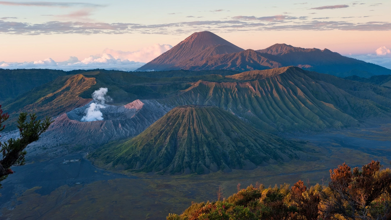Mount Bromo and surrounding mountains at sunrise. Image credit: stock.adobe.com
