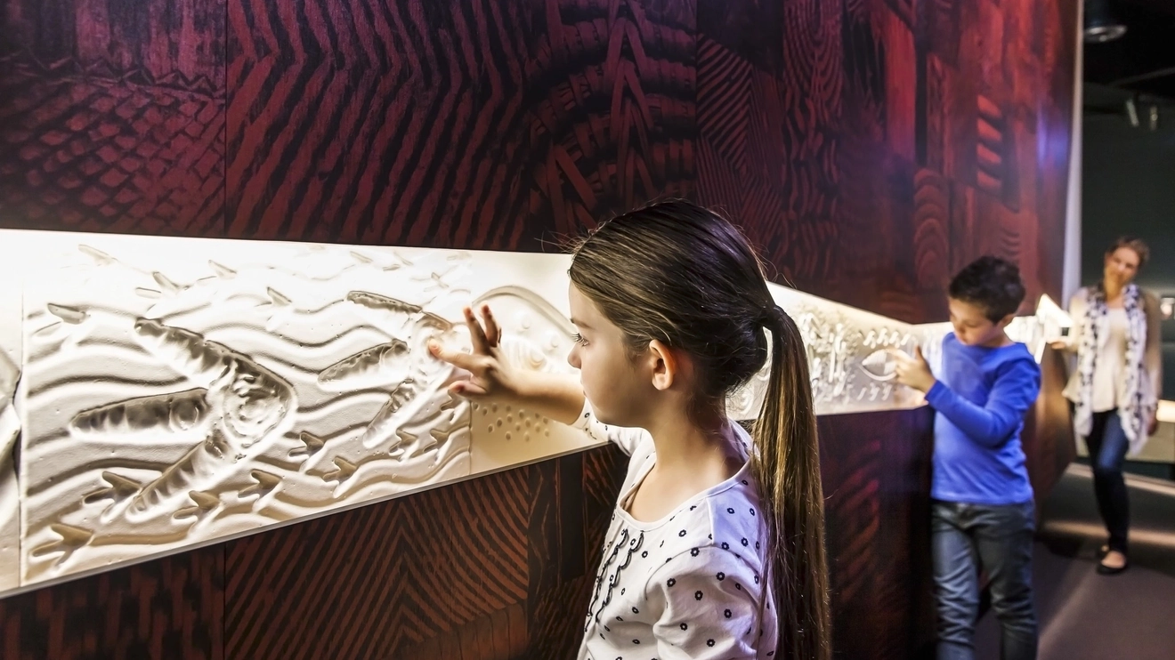 Children interact with exhibit at Melbourne Museum’s Bunjilaka Aboriginal Cultural Centre.