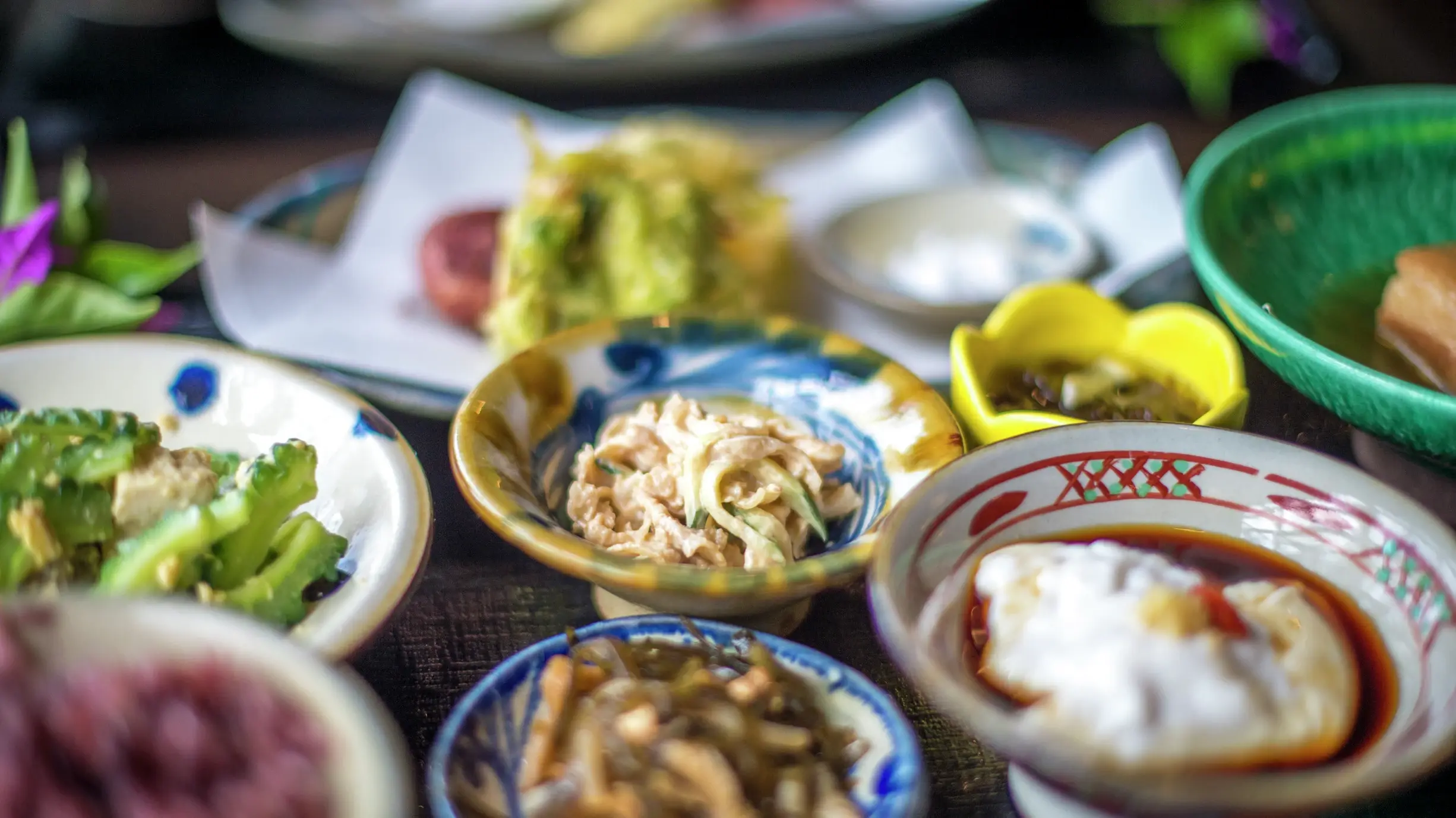 An array of Okinawan cuisine waiting to be feasted on. Image credit: Okinawa Convention and Visitors Bureau