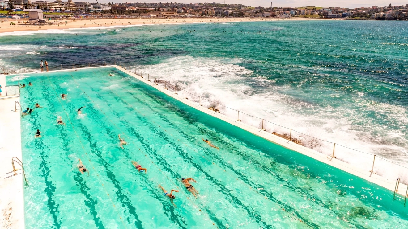 Main ocean pool at Bondi Icebergs Club, with Bondi Beach in the background.