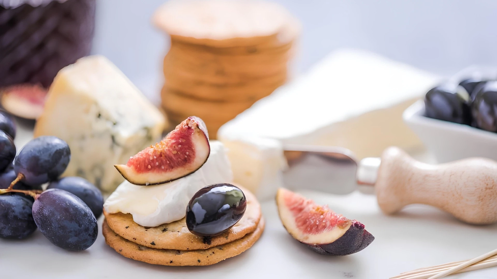 Sliced figs, crackers, posh cheese and olives: just some of the tasty treats you'll be served in Jetstar Business Class.