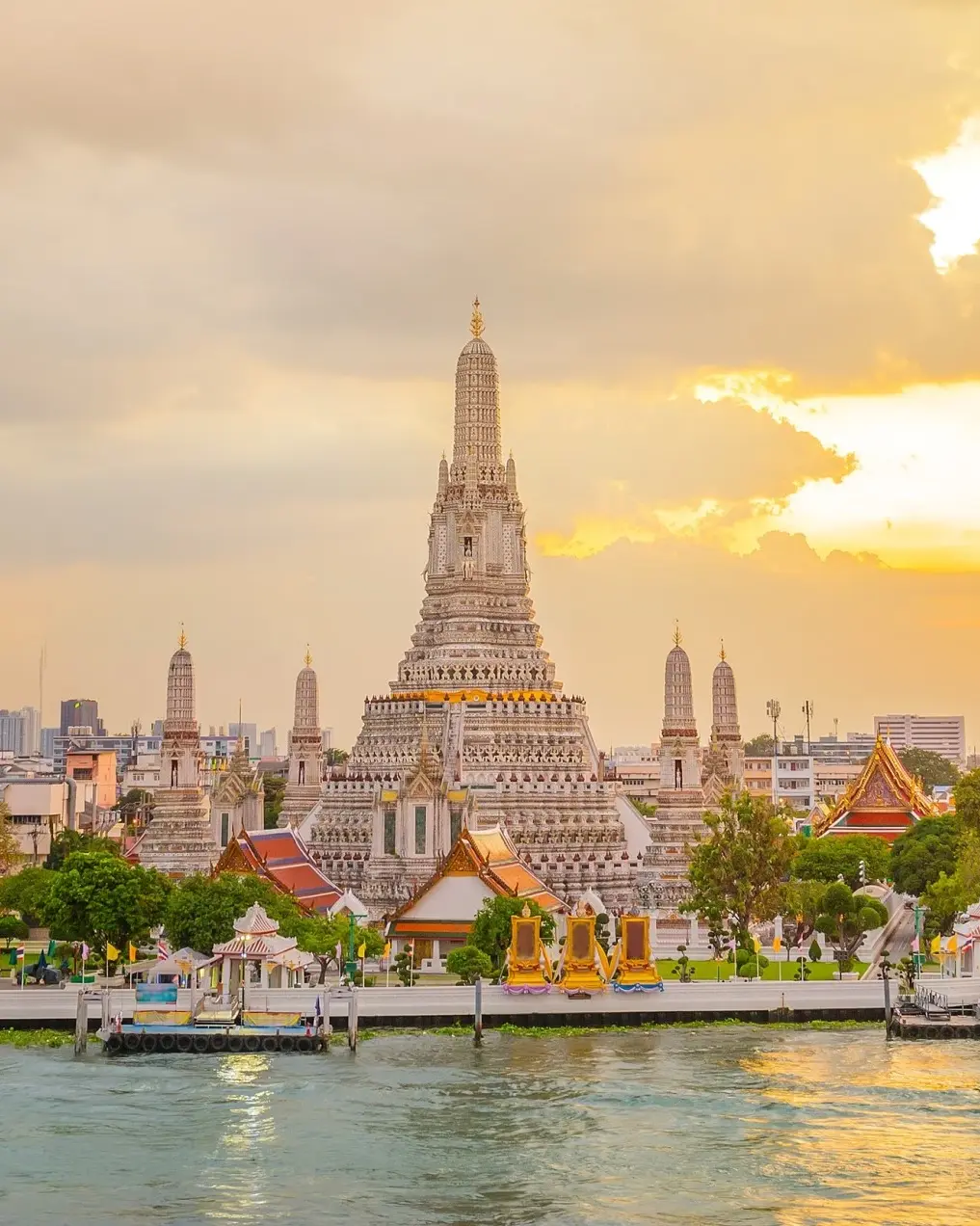 Wat Arun at sunset, with the Chao Phraya River in the foreground, Bangkok, Thailand. Image credit: stock.adobe.com