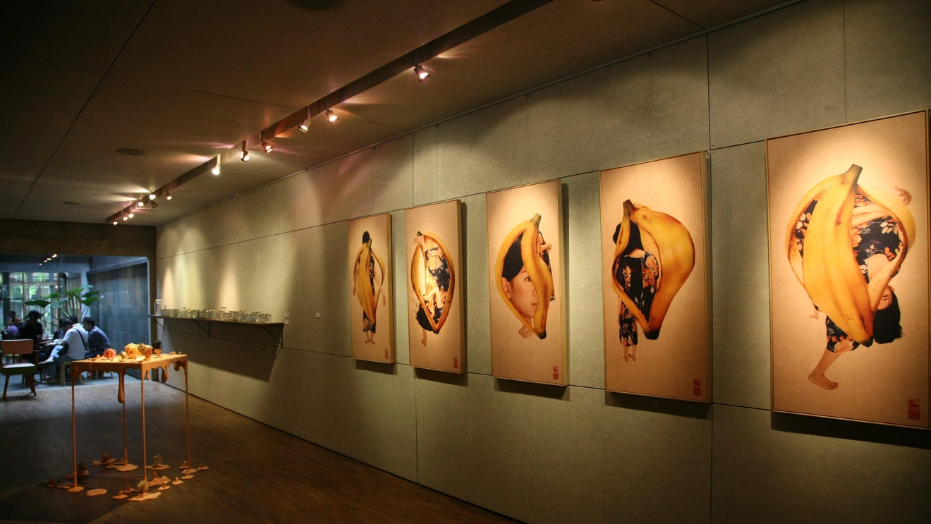 Five paintings on a wall and a table art installation, art exhibition inside dia.lo.gue art space, Jakarta. Image credit: dia.lo.gue 