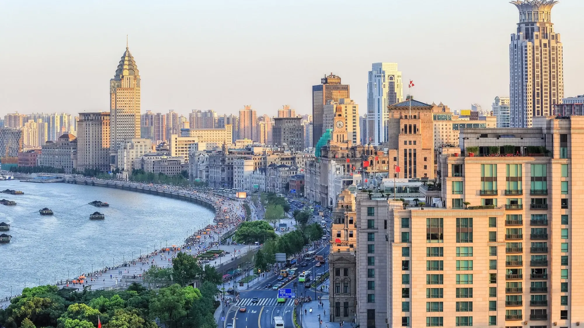 Shanghai city skyline at dusk, looking down at the Bund. Image credit: stock.adobe.com