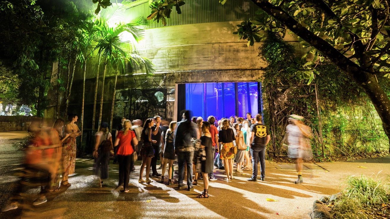 People queuing at night outside Tanks Arts Centre, Cairns. Image credit: Tanks Arts Centre