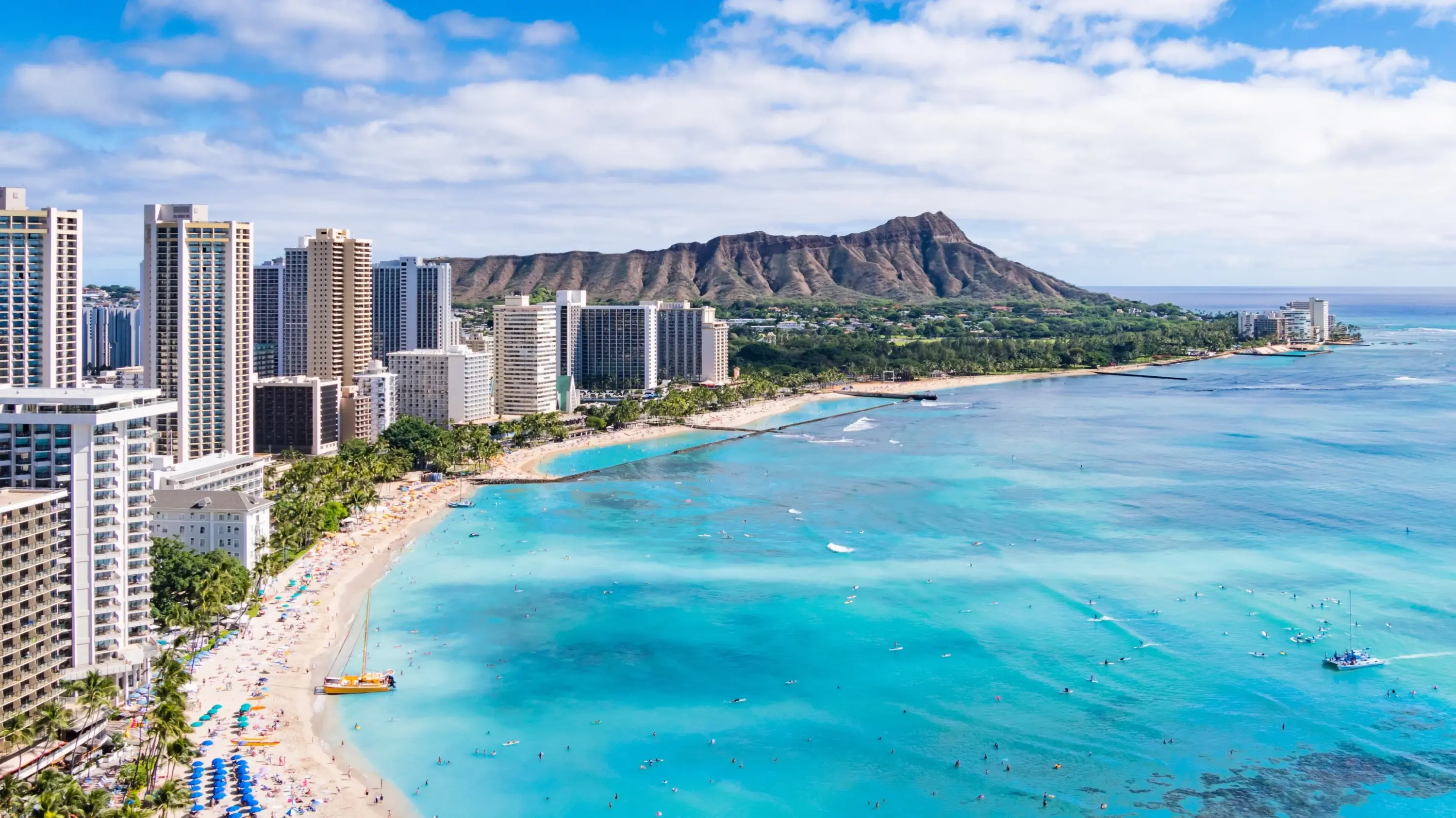 Waikiki Beach with Diamond Head Crater in the background, Honolulu, Oahu island, Hawaii. Image credit: stock.adobe.com