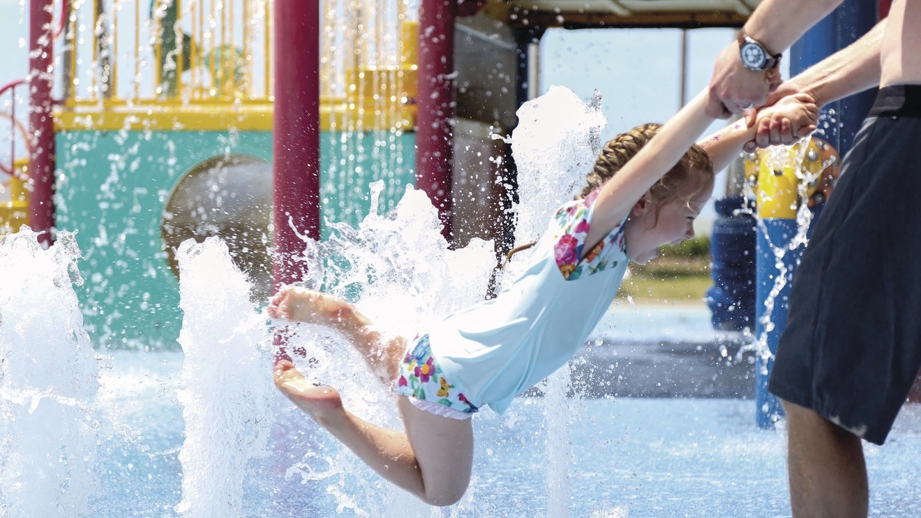 Little girl having fun at the Strand Water Park, Townsville. Image credit: Tourism and Events Queensland