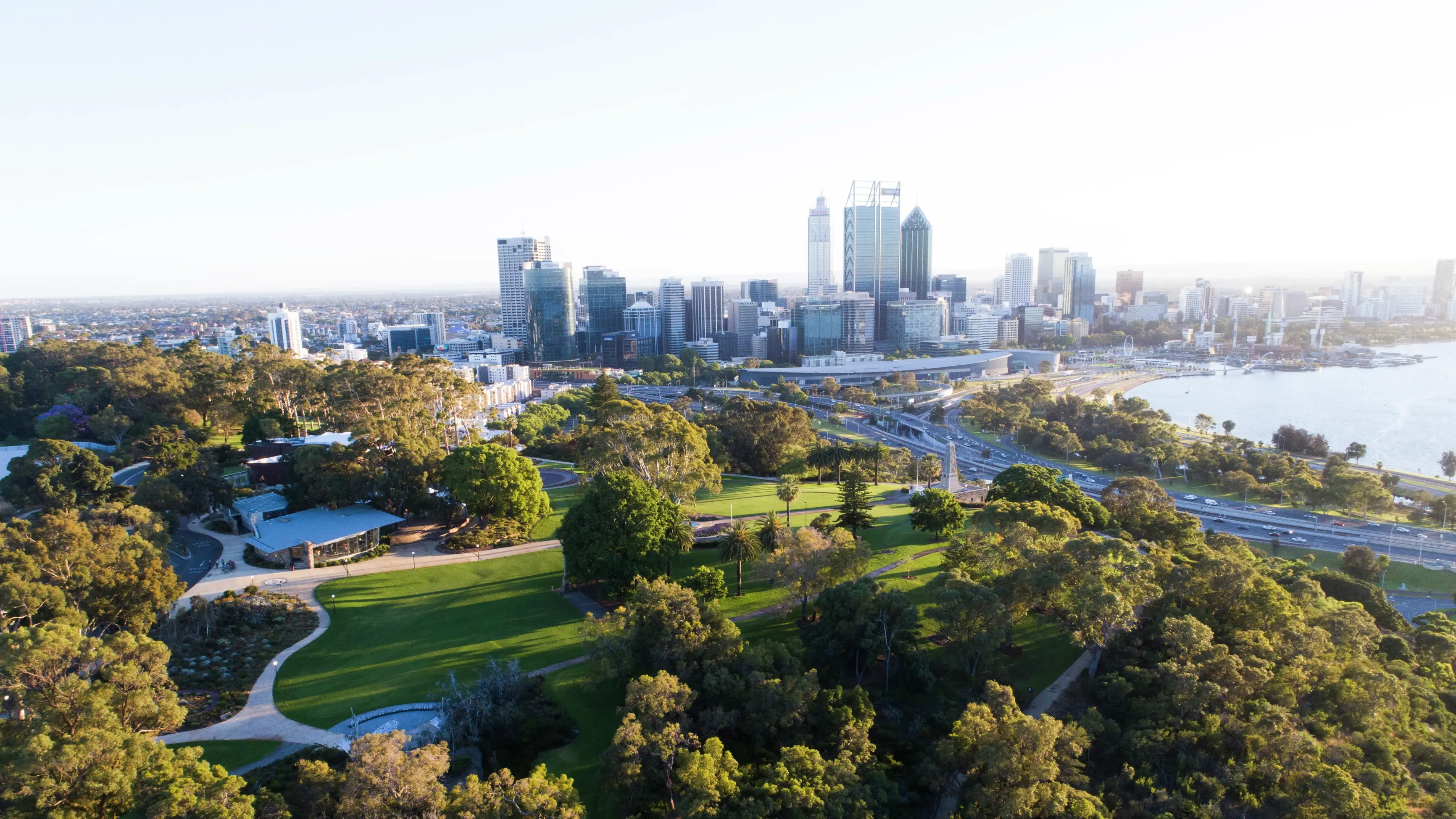 Aerial view of Kings Park and Botanic Garden with Perth City skyline in the background. Image credit: Tourism Western Australia