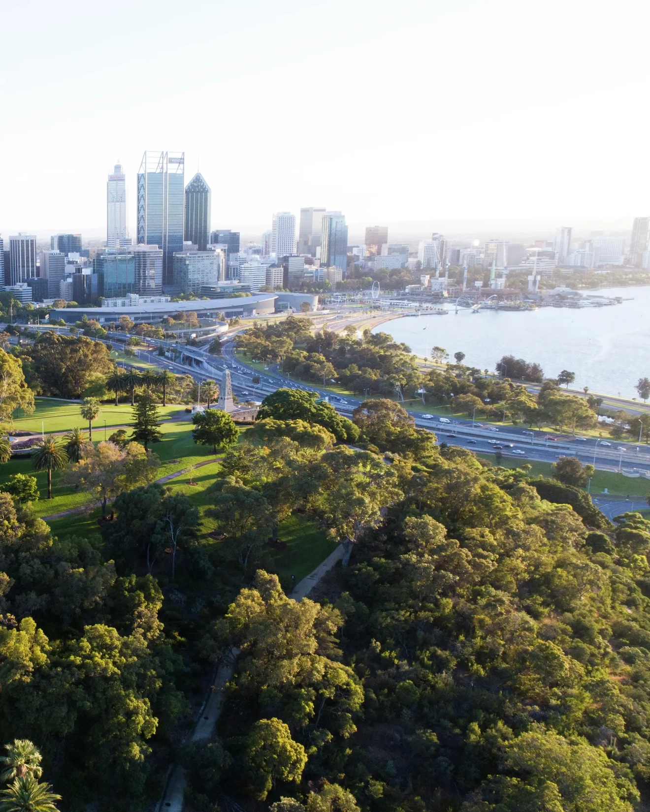 Aerial view of Kings Park and Botanic Garden with Perth City skyline in the background. Image credit: Tourism Western Australia